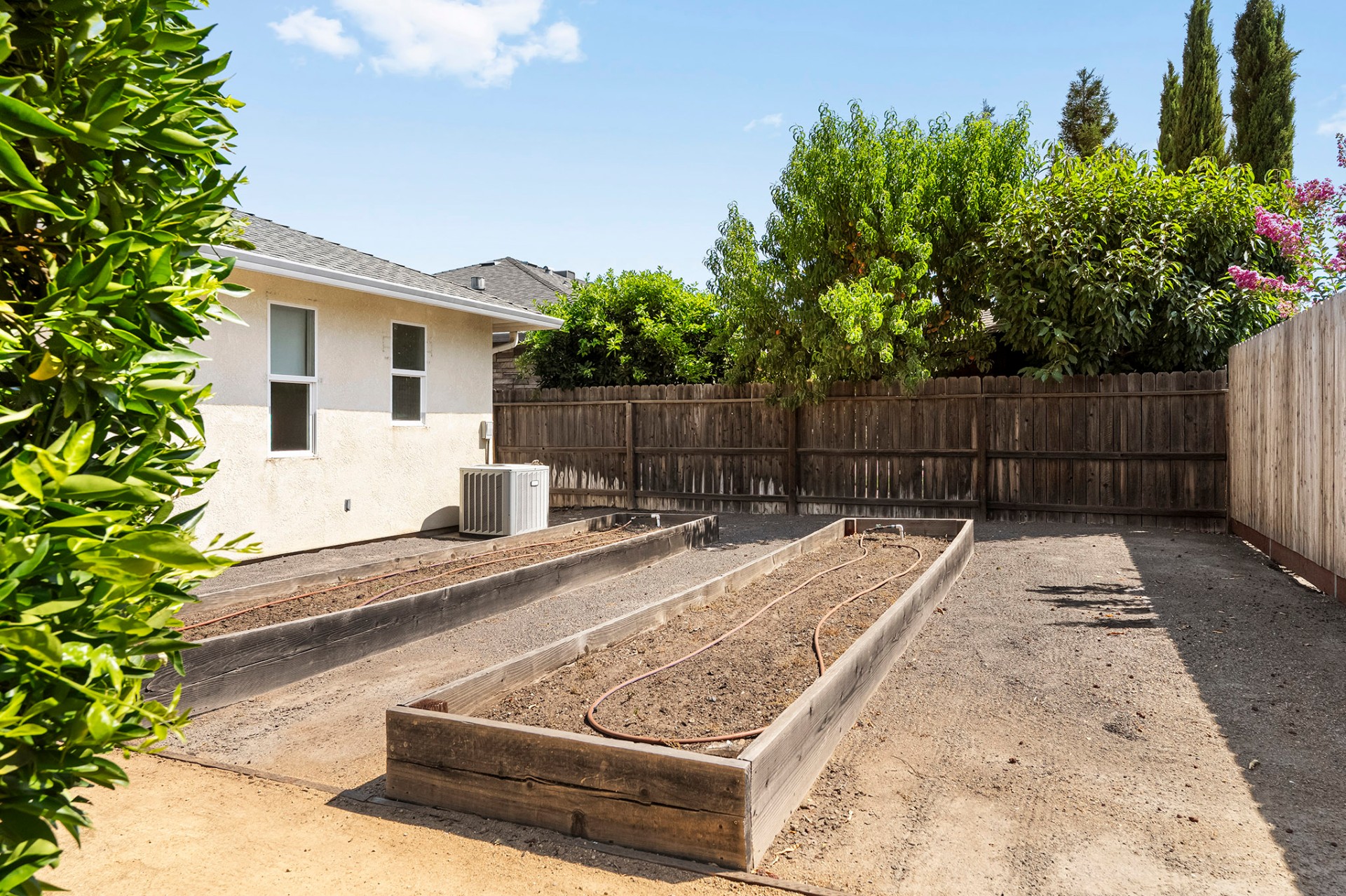 Side yard raised beds and AC unit