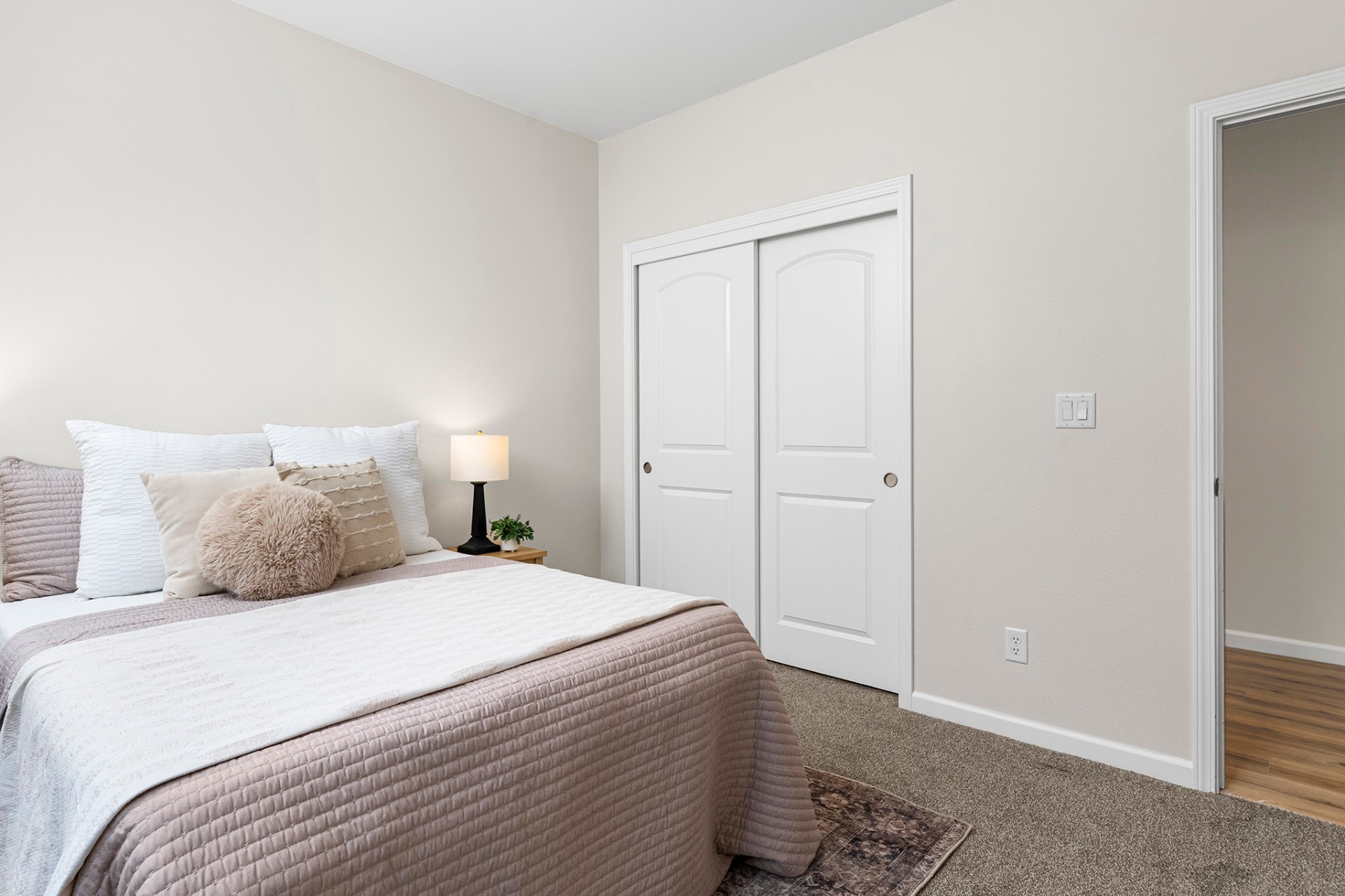 Bedroom with sliding closet
